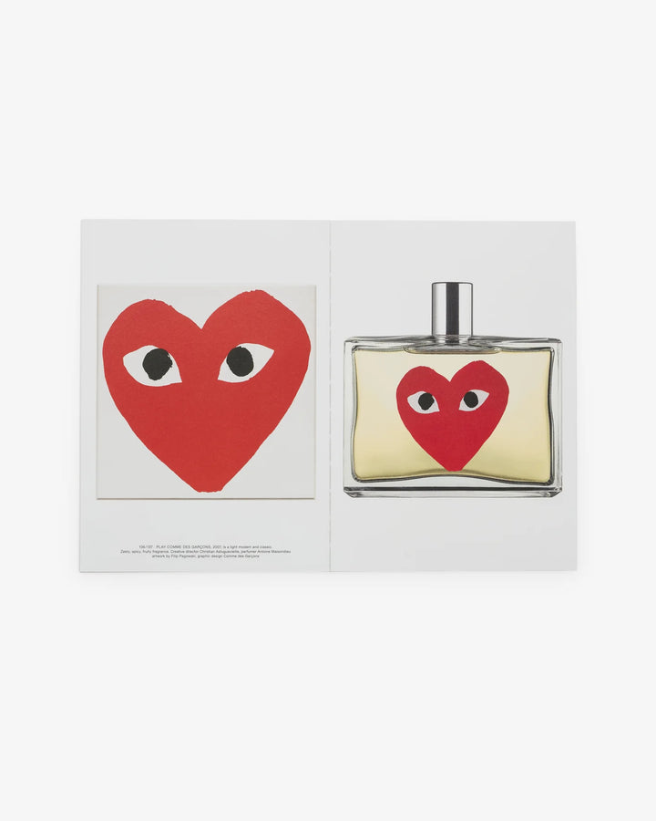 Cover of the Comme des Garçons Parfums 1994–2025 book by Dino Simonett, showing a close-up of an amber Eau de Parfum bottle on a pale grey background - view 3