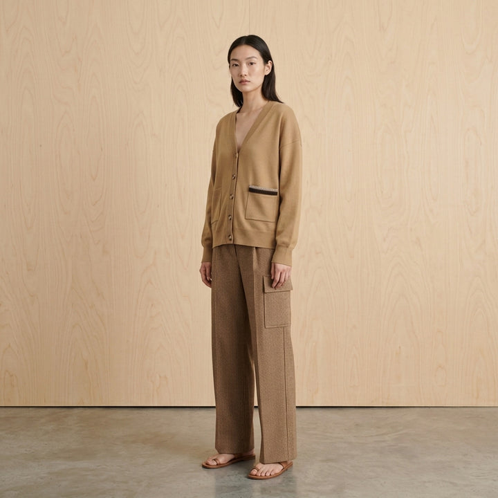3.1 Phillip Lim Curved Tweed Wide-Leg Pants in micro houndstooth camel weave, featuring a high waist, belt loops, cargo patch pocket, and wide flared hem — rear product view on white background - lifestyle