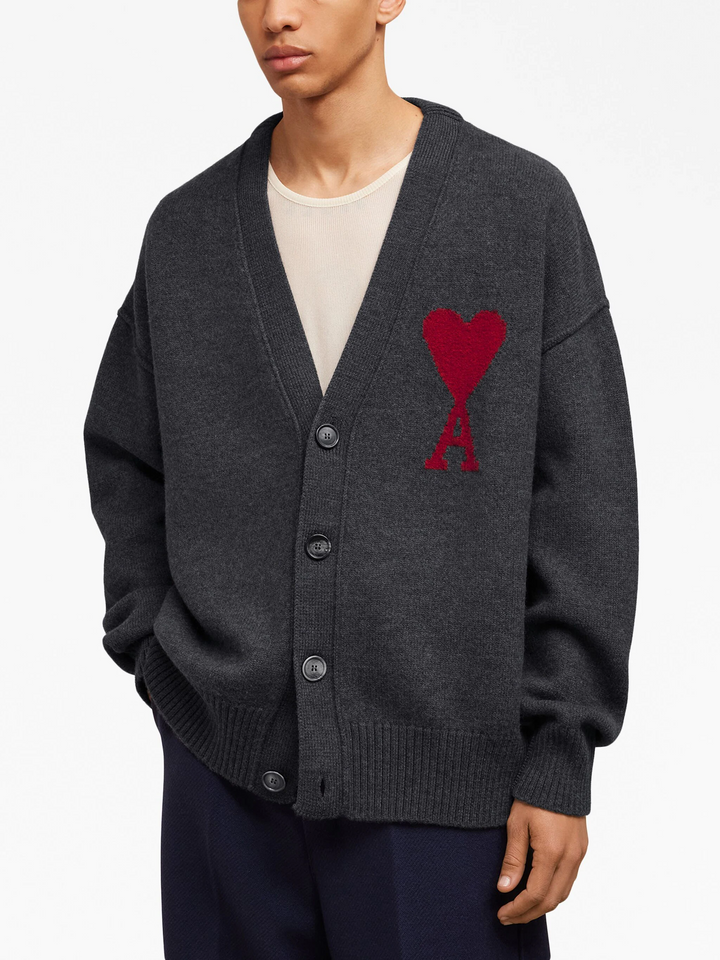 AMI de Coeur cream knit cardigan with red intarsia heart-and-A logo on chest, V-neckline and button front closure