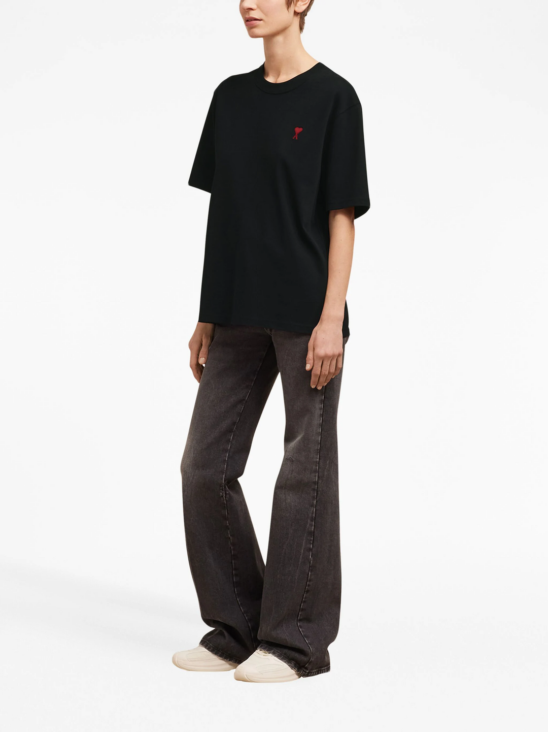 AMI Paris De Coeur Boxy Fit T-Shirt in black with red embroidered heart logo on chest, flat lay on white background
