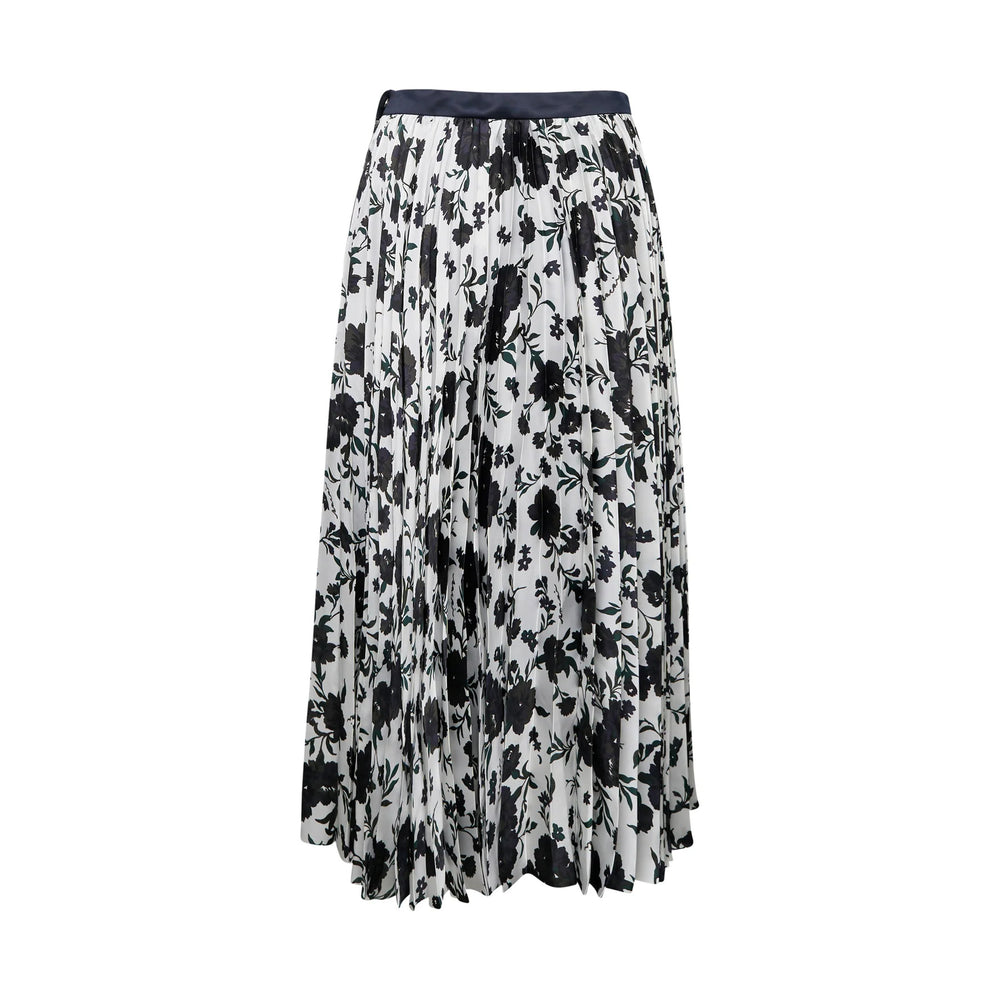 sacai Pattern Mix Pleated Skirt featuring a dark floral print panel alongside a multicolour stripe panel, with allover knife pleating and an asymmetric midi length