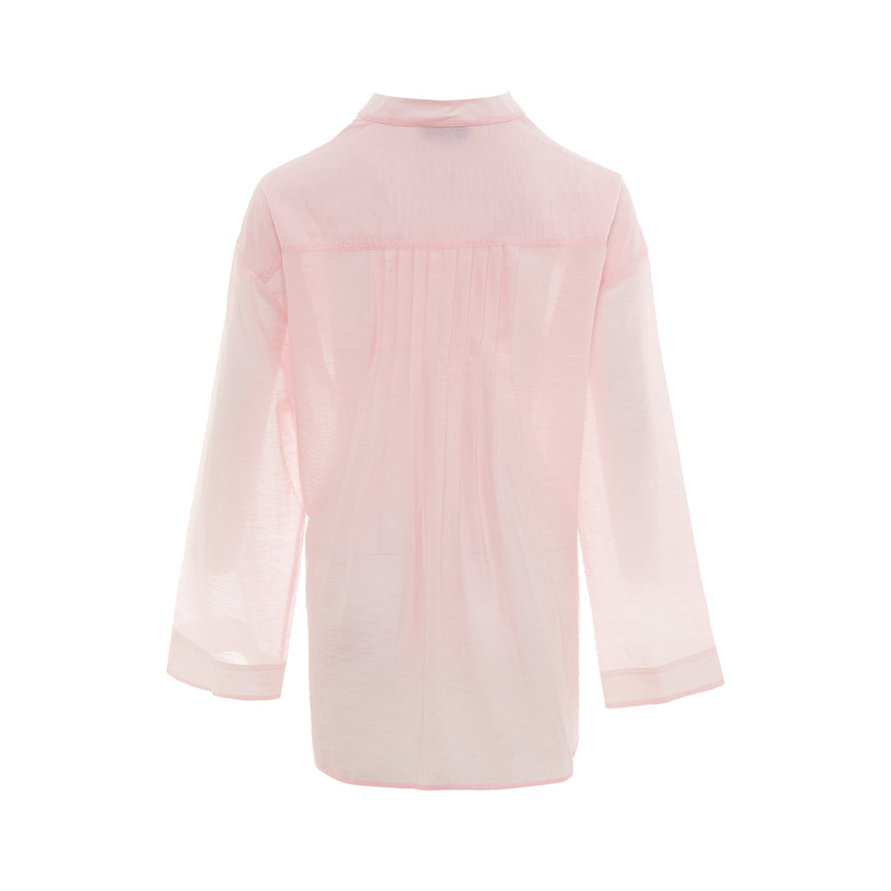 Lee Mathews Ondine Shirt in blush pink, back view showing pintuck pleat detail, yoke panel, and long sleeves with cuffs
