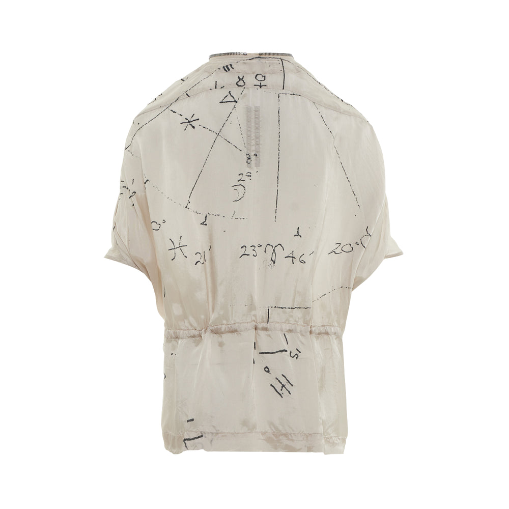 Rick Owens Sail Jacket in cream with black abstract script print, silver zip front, drawstring waist, and wide batwing sleeves