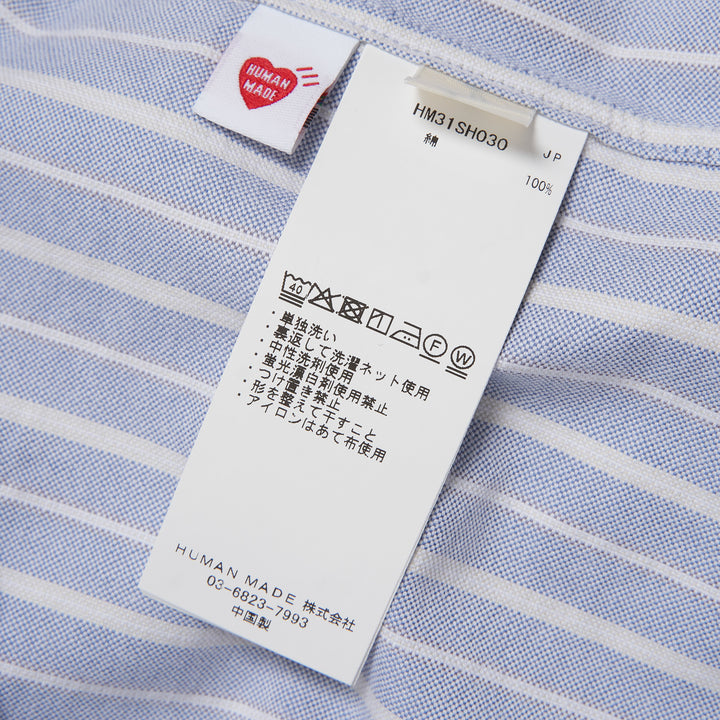 HUMAN MADE Stripe Oxford Button-Down Shirt in blue and white vertical pinstripe with tiger crest badge and button-down collar