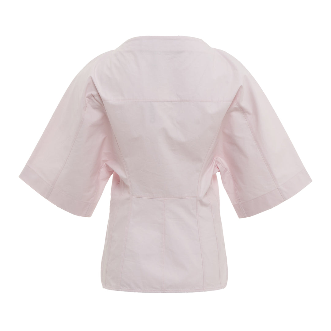 Jacquemus La Chemise Moisson Blouse in light blush pink with wide structured sleeves and fitted waist, back view