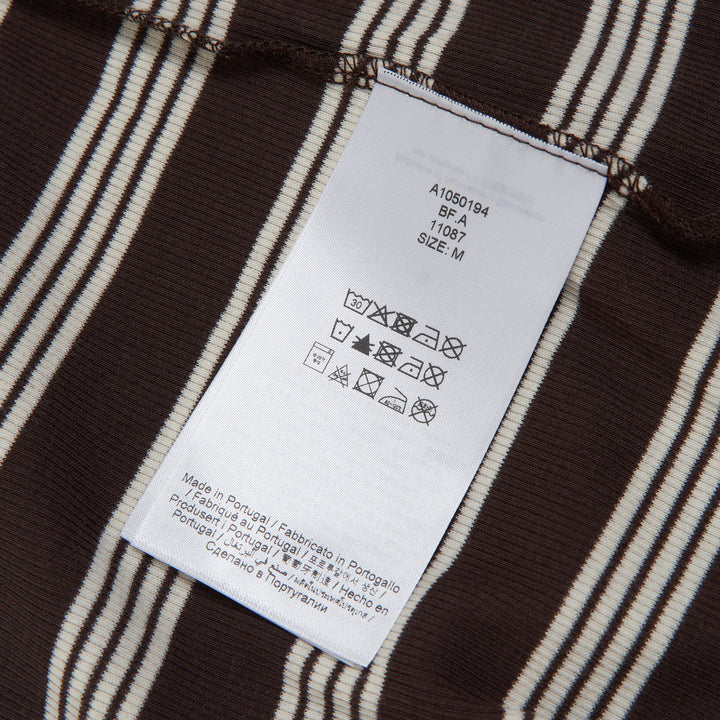 GANNI Striped Ribbed Long Sleeve Top in dark brown and cream horizontal stripes with crew neckline and fitted silhouette