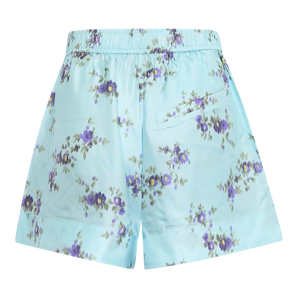 Ganni Printed Silk Twill Elasticated Shorts in light blue with an allover purple floral print and an elasticated waistband