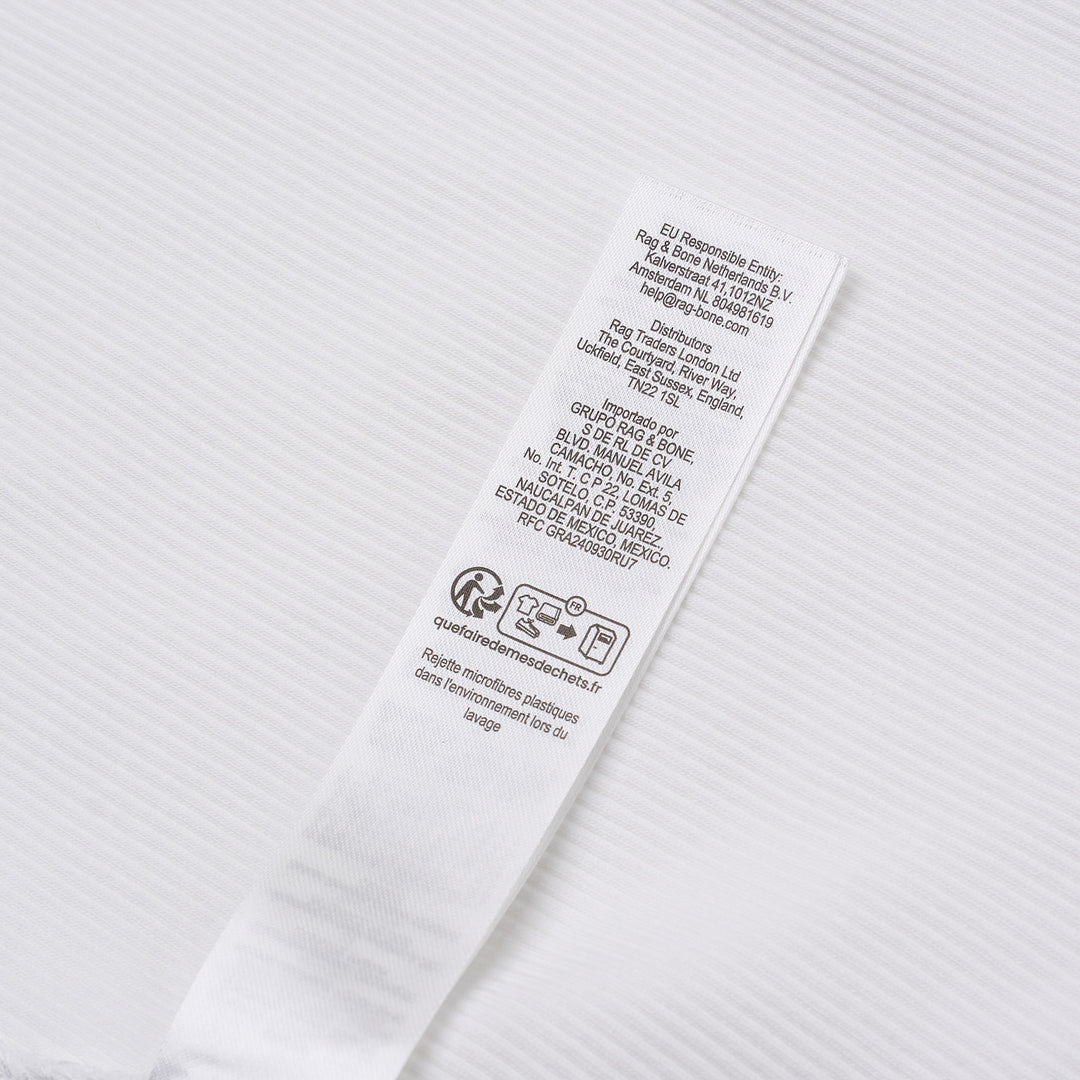 rag & bone Essential Rib Long Sleeve Crew in white, featuring a slim ribbed silhouette, elevated crew neckline, and ribbed cuffs