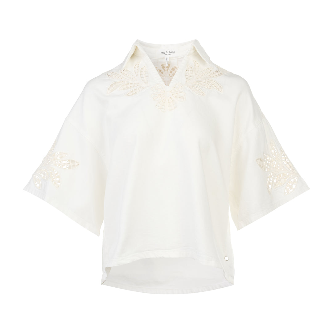 rag & bone Lucy Lace Popover Top in white with floral cutwork lace panels across the yoke and sleeve hems, open polo collar, and wide relaxed sleeves