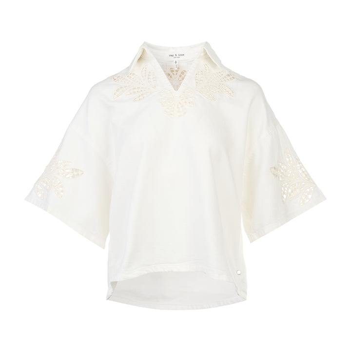 rag & bone Lucy Lace Popover Top in white with floral cutwork lace panels across the yoke and sleeve hems, open polo collar, and wide relaxed sleeves