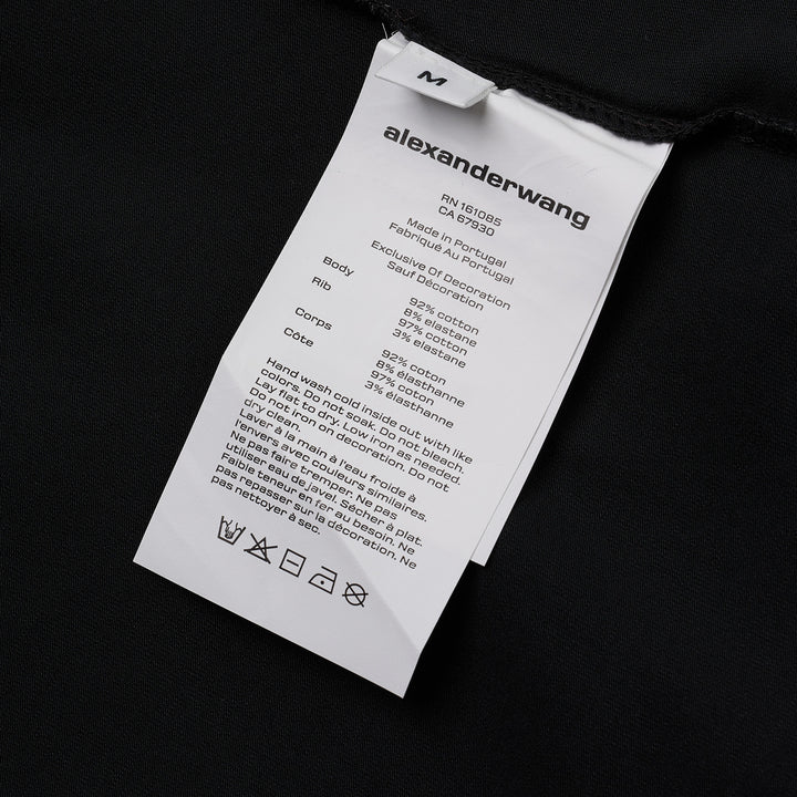 Alexander Wang white fitted crew-neck tee with hotfix crystal 'alexanderwang' logo text arranged in a radiating pinwheel sunburst pattern across the chest