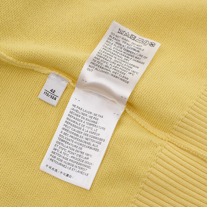 Thom Browne Short Sleeve Intarsia Knit Tee in baby pink with signature 4-bar cream stripe on the sleeve and contrast cream crew neckline, front view