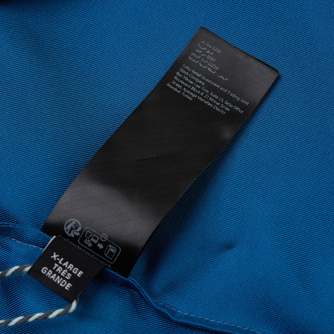 Amiri Arts District Short Sleeve Camp Shirt in blue ombré with tonal logo graphic print and mother-of-pearl buttons