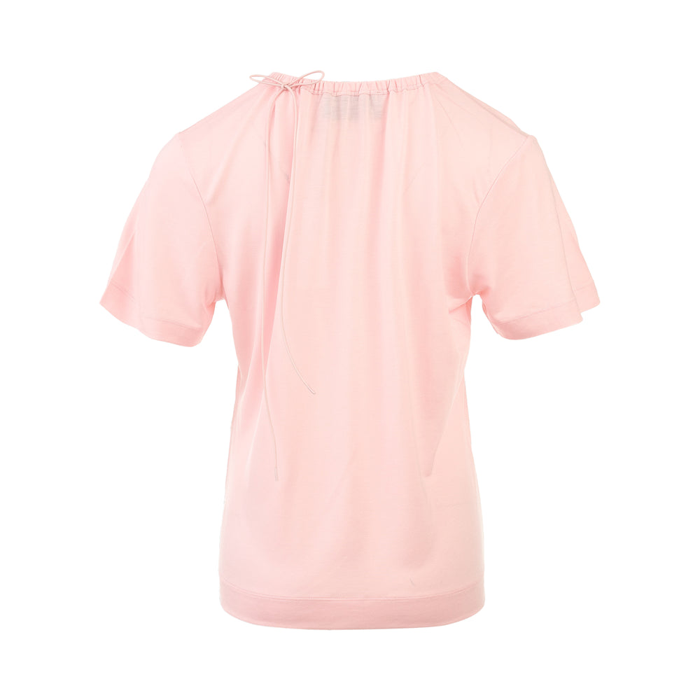 Simone Rocha Cord Neck Easy Tee in blush pink with a gathered drawstring neckline, short sleeves, and a fitted ribbed hem