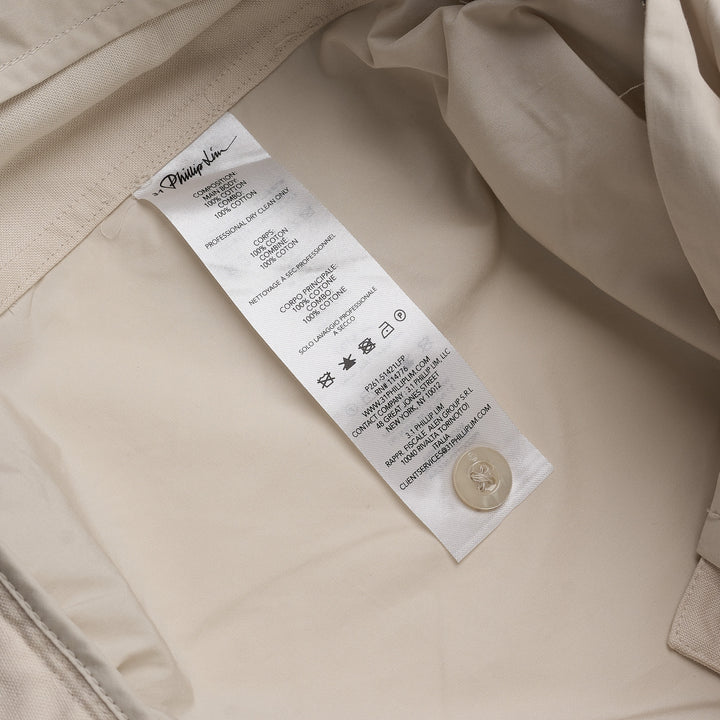 3.1 Phillip Lim Double Waistband Poplin Pants in ecru, featuring a wide-leg silhouette, drawstring waistband, and thigh patch pockets