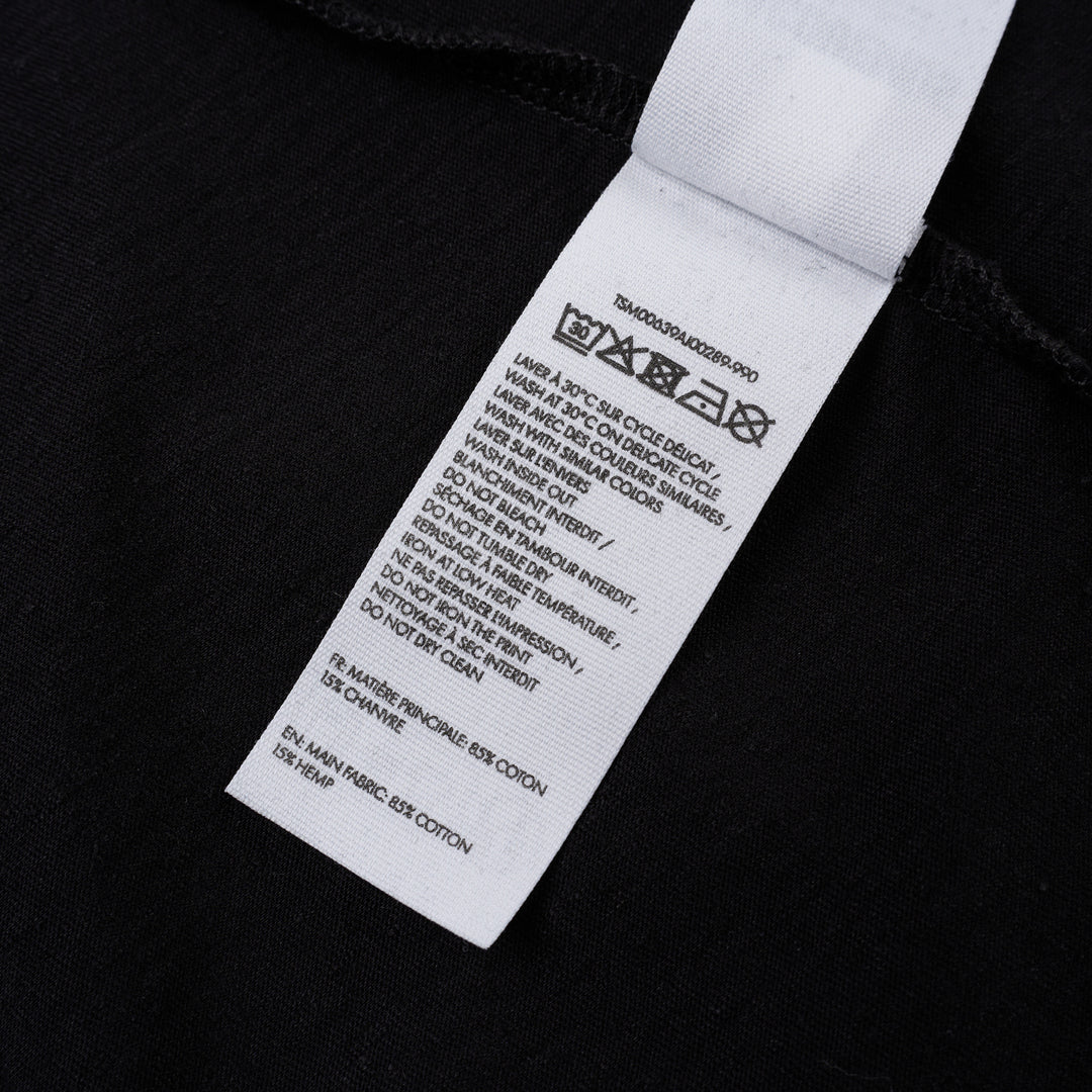 Jacquemus black oversized short sleeve crew neck tee with cursive embroidered Jacquemus logo across the chest