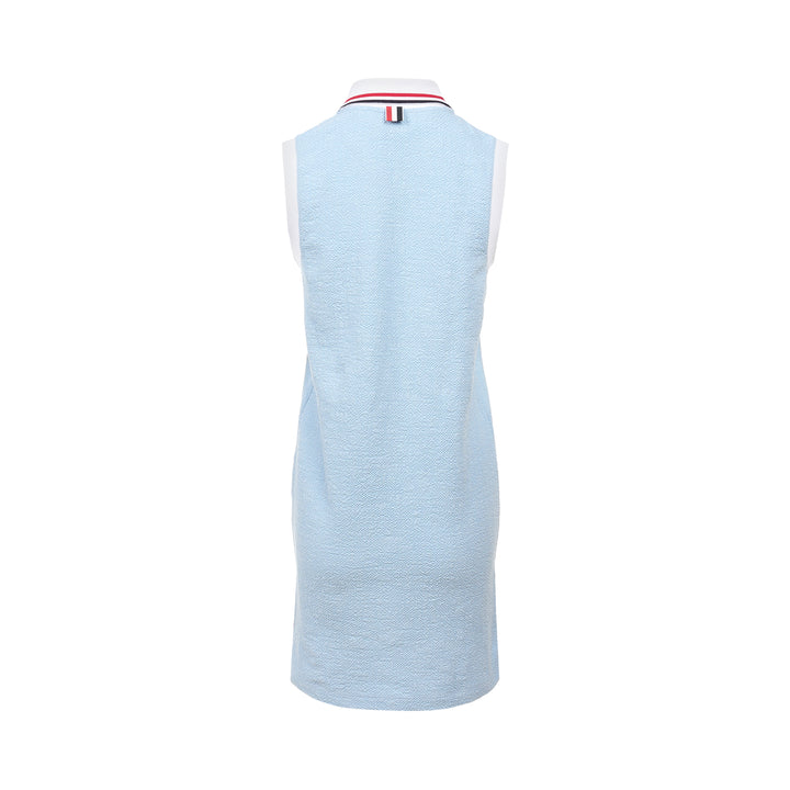 Thom Browne sleeveless polo dress in light blue bouclé with white collar featuring red, white, and blue stripe tipping, button placket, and signature 4-bar stripe at the hem - view 2