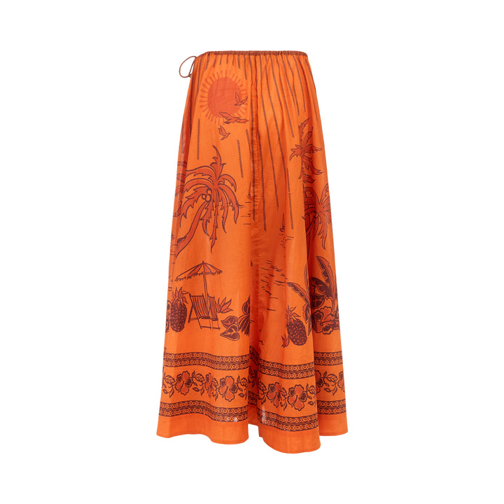 Alemais Boathouse Midi Skirt in orange with tropical beach print featuring palm trees, sun illustration, and floral border hem, displayed on white background