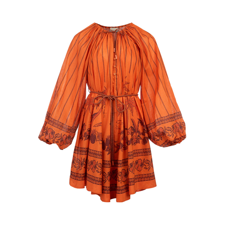 Alemais Boathouse Mini Dress in orange cotton with tropical palm and floral border print, balloon sleeves, gathered neckline with tassel tie, and coordinating rope belt