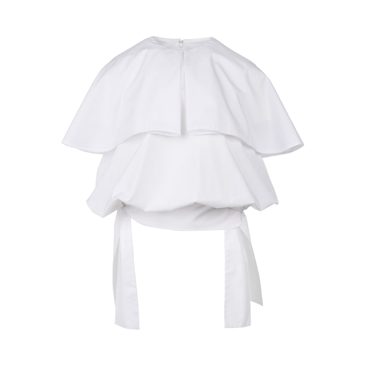 Enfold Big Collar Layered Blouse in white, rear view showing tiered cape collar, voluminous peplum hem, back zip closure, and long self-fabric waist ties