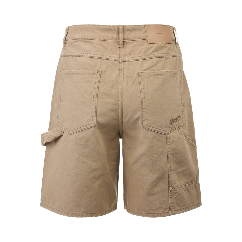 Represent Carpenter Shorts in tan canvas with double-knee panelling, contrast topstitching, rivet hardware, and a hammer loop on the outer leg - view 2