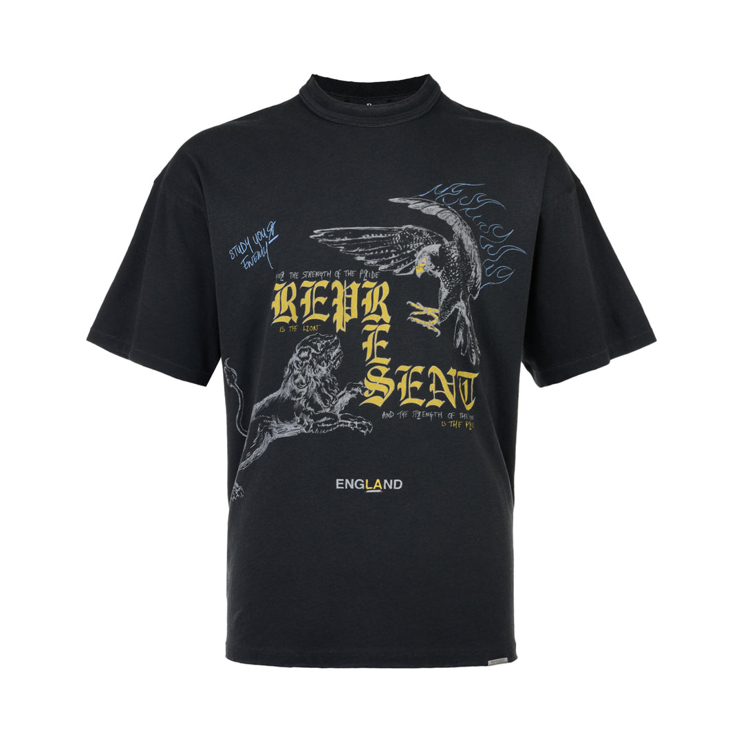 Represent Enemy Tee in washed black, featuring oversized gothic 'Represent' lettering, a hand-drawn lion and diving eagle illustration, blue flame detailing, and 'England' branding on heavyweight cotton