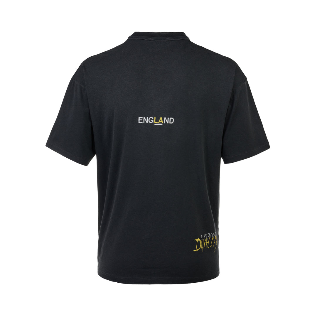 Represent Enemy Tee in washed black, featuring oversized gothic 'Represent' lettering, a hand-drawn lion and diving eagle illustration, blue flame detailing, and 'England' branding on heavyweight cotton