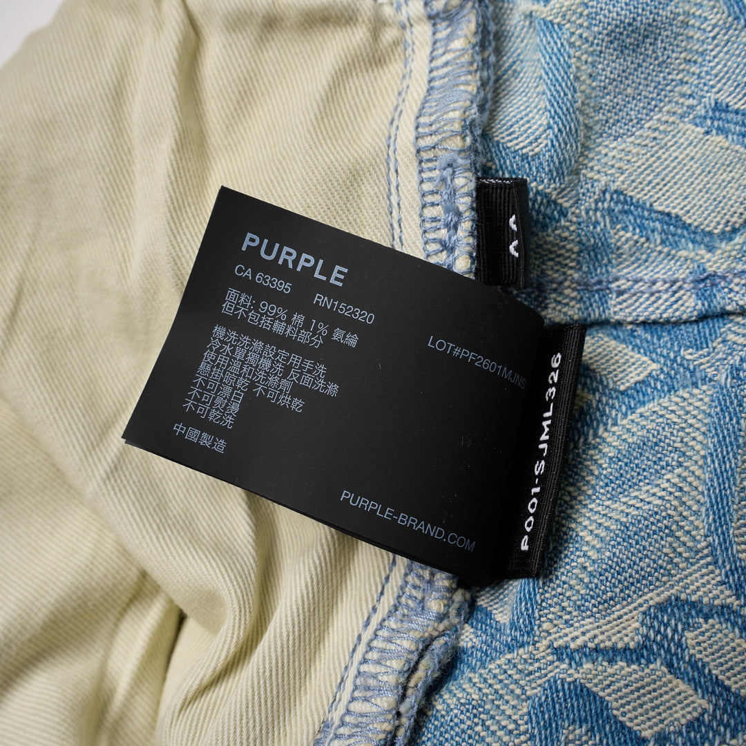 Purple Skinny Jacquard Monogram Jeans in light wash denim featuring an all-over tonal monogram jacquard weave and distressed knee detailing - view 6