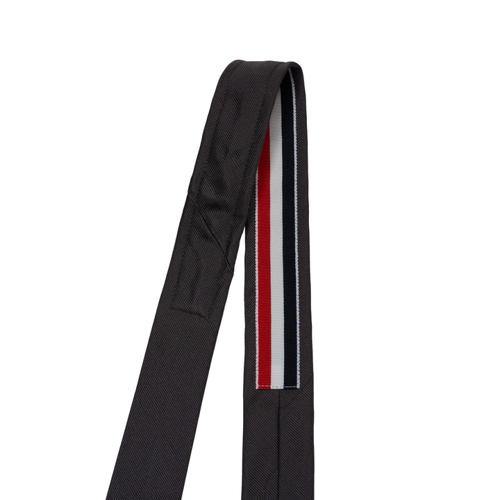 Thom Browne charcoal grey silk tie with diagonal red, white, and blue stripe - view 2