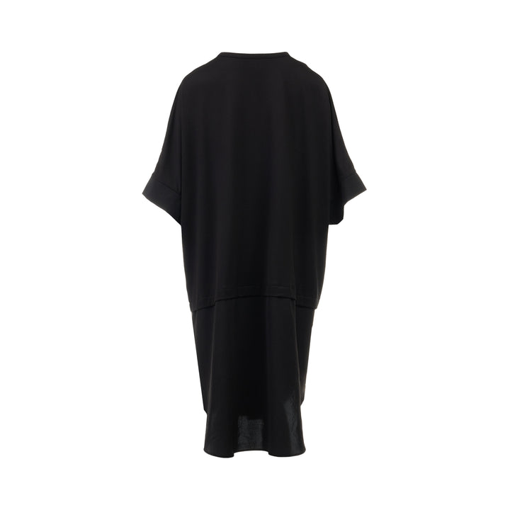 Y's black oversized round neck shirt dress with short folded cuffs, layered T-shirt upper, and buttoned skirt panel, displayed on white background - view 2