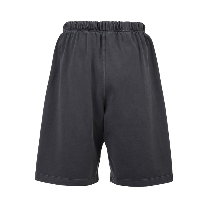 Fear of God Essentials 90s Shorts in washed charcoal with cream rope drawstring waistband and tonal logo embroidery at the hem