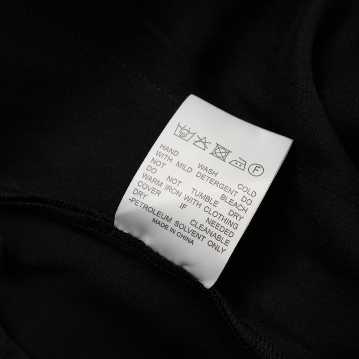 Black wide-leg crepe acetate trousers with a front pleat and single-button waist, shown from the front - view 4