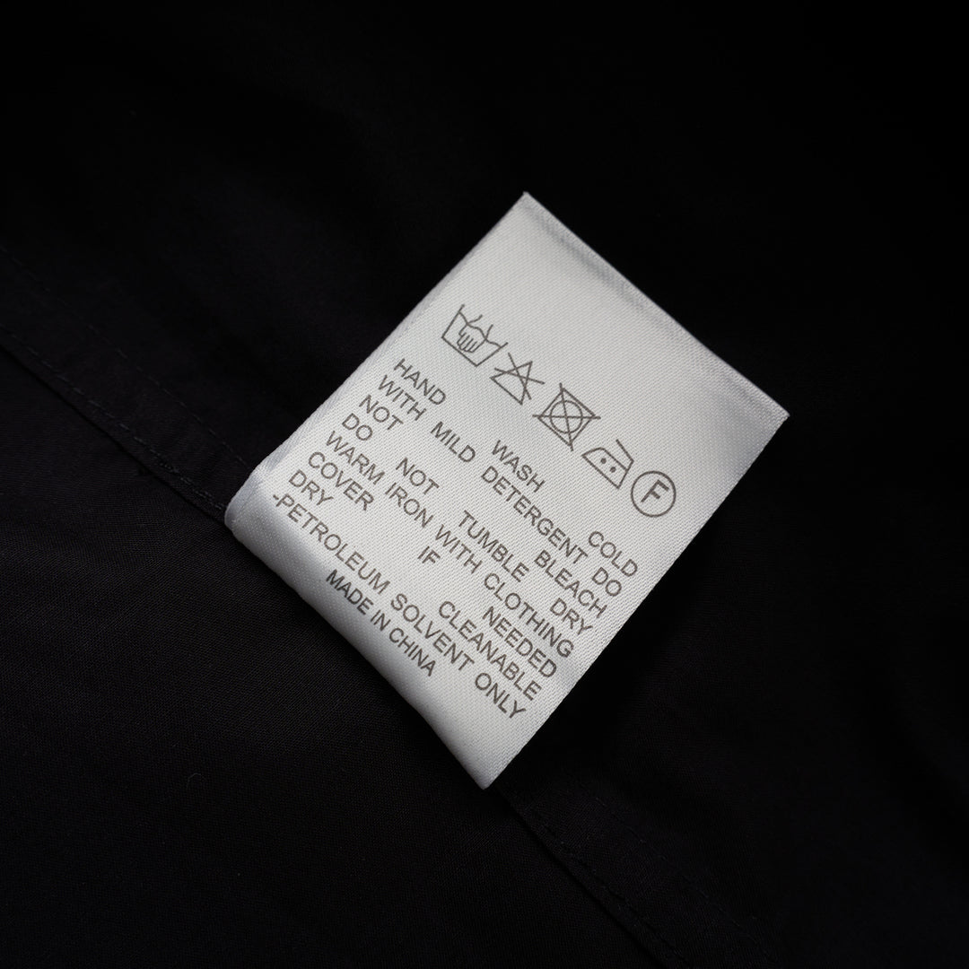 Black cotton tuxedo-style shirt with pleated bib front, concealed button placket and pointed collar from Club21 Collection - view 4