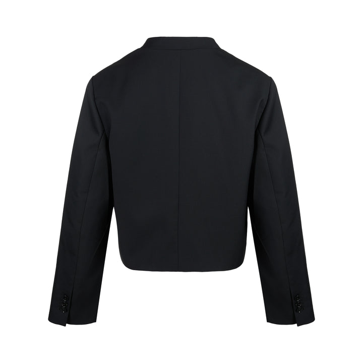 Black cropped collarless jacket in satorial wool mix with asymmetric overlapping front and chest welt pocket - view 2