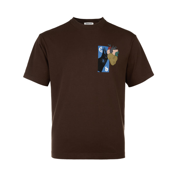 Undercover Heart Graphic Tee in dark brown, featuring a collage-style chest graphic with an anatomical heart, raven motif, and Old English typography on a relaxed-fit crew neck cotton tee.