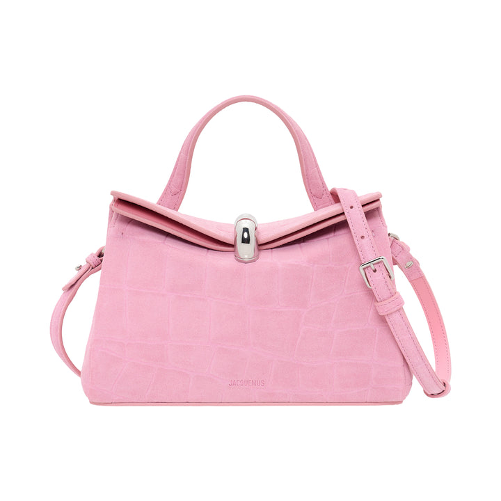 Jacquemus Le Petit Valerie handbag in pink croc-embossed leather with rolled top handle, adjustable crossbody strap, and silver turn-lock closure