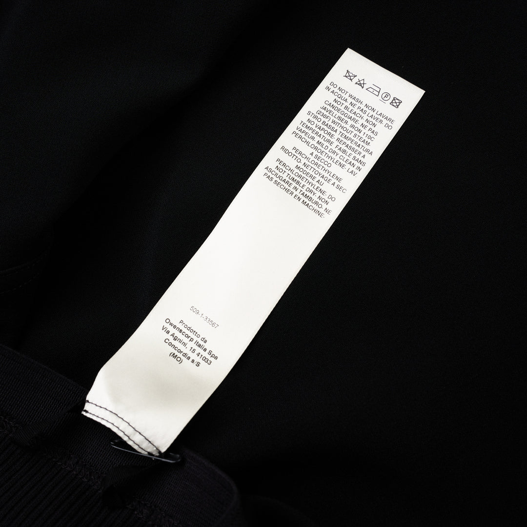 Rick Owens Short Bias Skirt in black, featuring a wide ribbed waistband and fluid bias-cut A-line silhouette, photographed flat on a white background