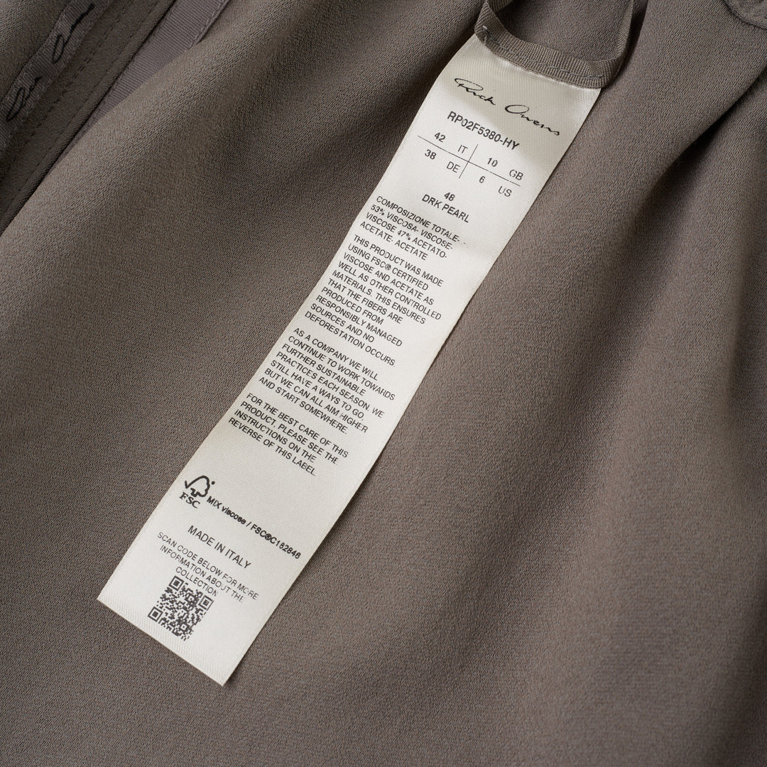 Rick Owens black boxer shorts with elasticated waistband, contrast ecru rope drawstring, and relaxed voluminous silhouette, photographed on a white background