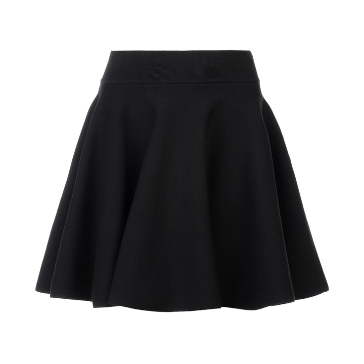 AMI Godet Short Skirt in black, featuring a full circular flared silhouette and wide ribbed waistband, displayed on a white background