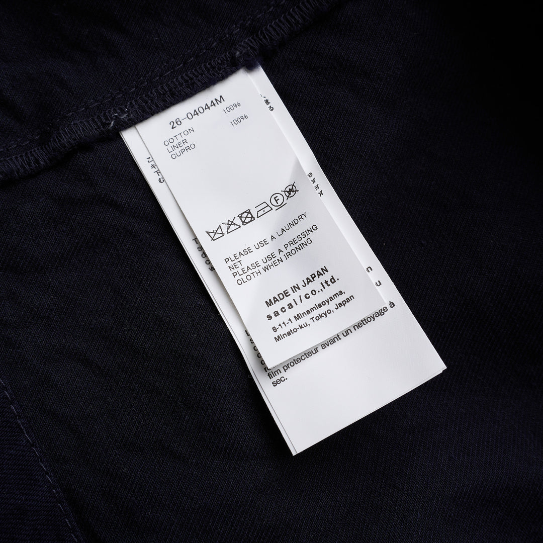 sacai indigo denim blazer jacket with notched lapels, contrast golden topstitching, flap chest pockets and gold anchor buttons - view 3