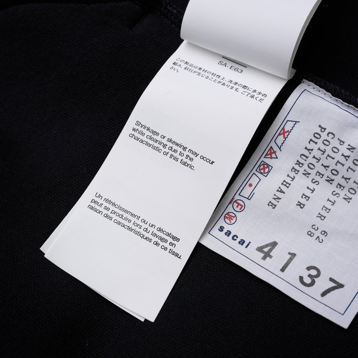 sacai Sponge Sweat Blouson in navy with asymmetric diagonal zip, contrast dark ribbed hem and cuffs, chest snap tabs and off-white sleeve zip pocket - view 7