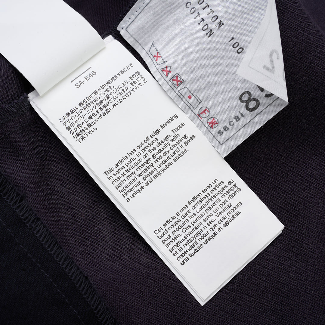 sacai belted peplum denim midi skirt in dark indigo with contrast topstitching, shown from the front - view 5