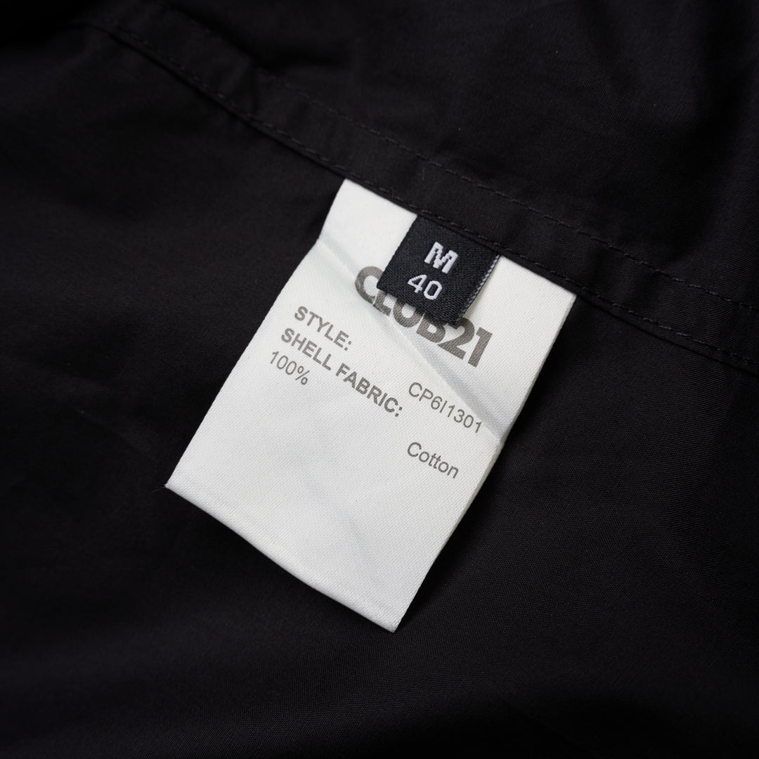 Black sleeveless cotton shirt with pintucked bib front, mandarin collar and self-fabric waist tie - view 3