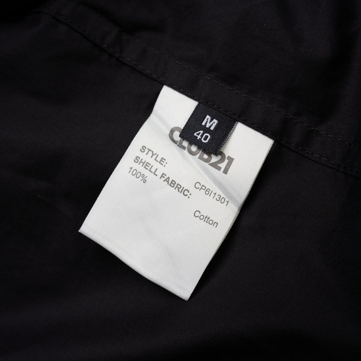 Black sleeveless cotton shirt with pintucked bib front, mandarin collar and self-fabric waist tie - view 3