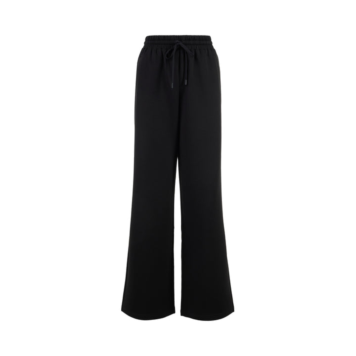Black wide-leg Lena pants in high-stretch modal jersey with an elasticated drawstring waistband, shown from the front