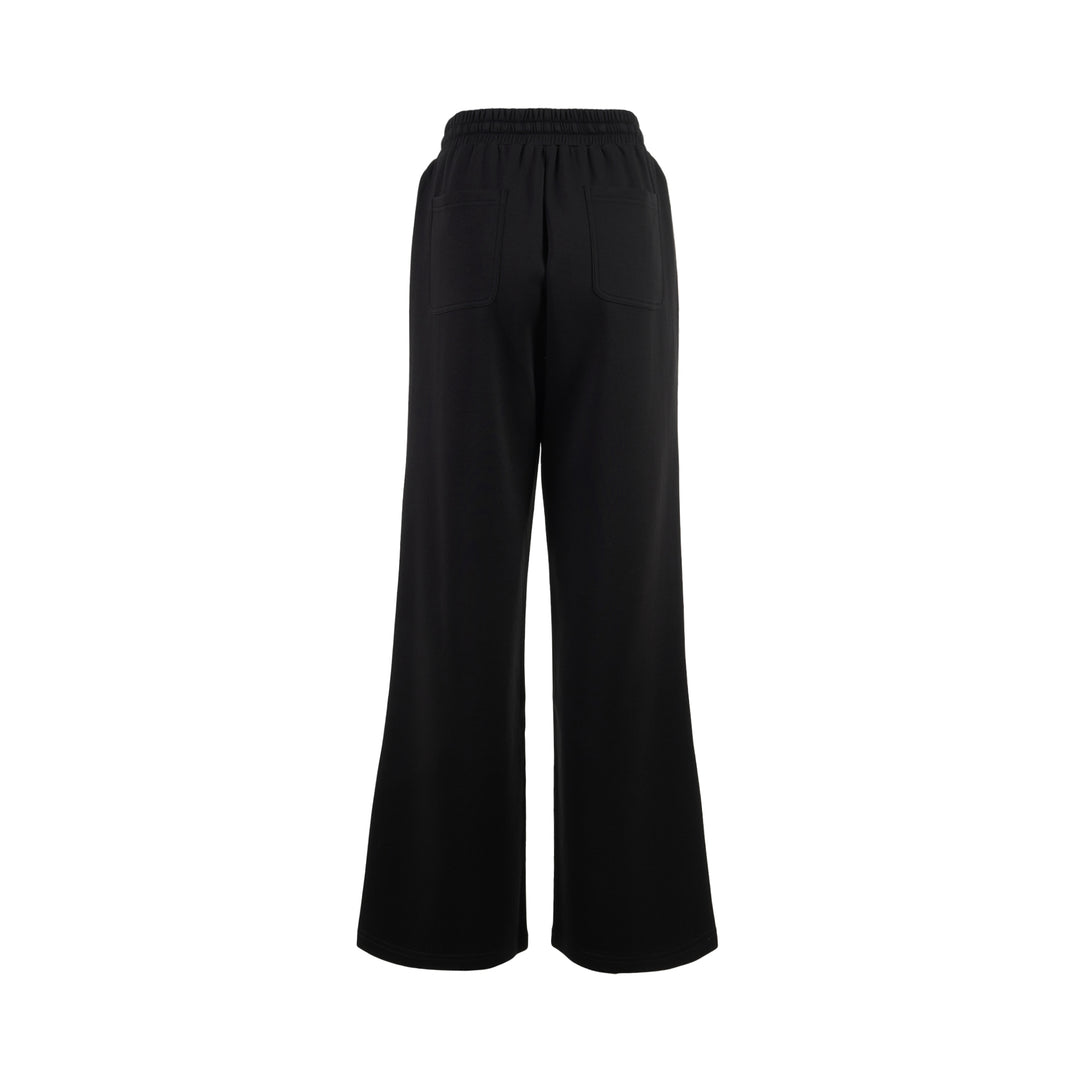 Black wide-leg Lena pants in high-stretch modal jersey with an elasticated drawstring waistband, shown from the front - view 2