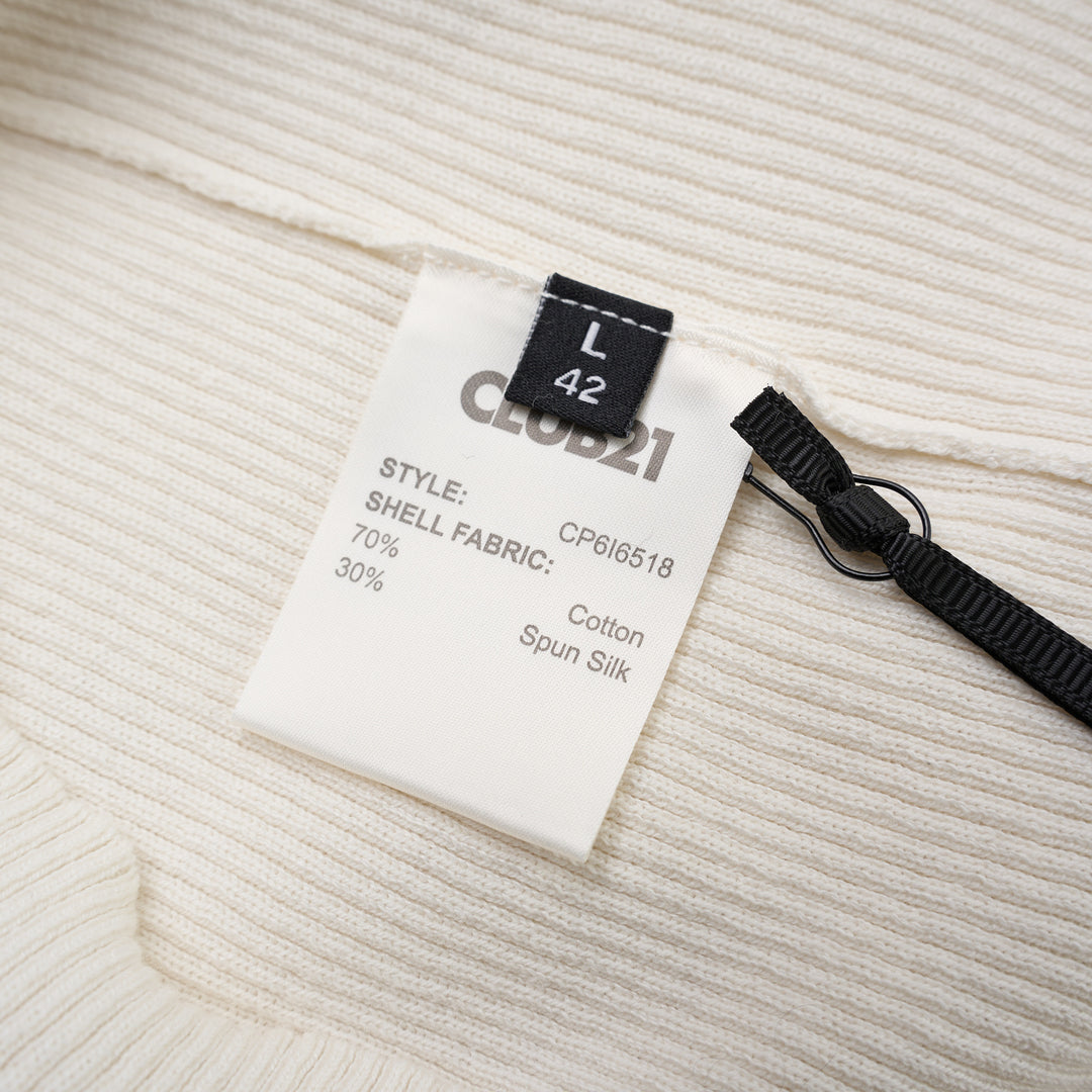 Ivory ribbed silk-cotton knit top with black contrast trim at the scoop neckline and short sleeve cuffs, by Club21 Collection - view 3