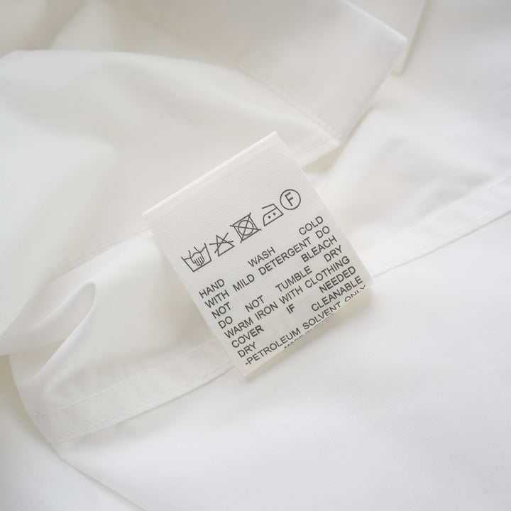 White structured cotton tuxedo shirt with pintucked bib front, pointed collar, concealed placket and long buttoned-cuff sleeves - view 3
