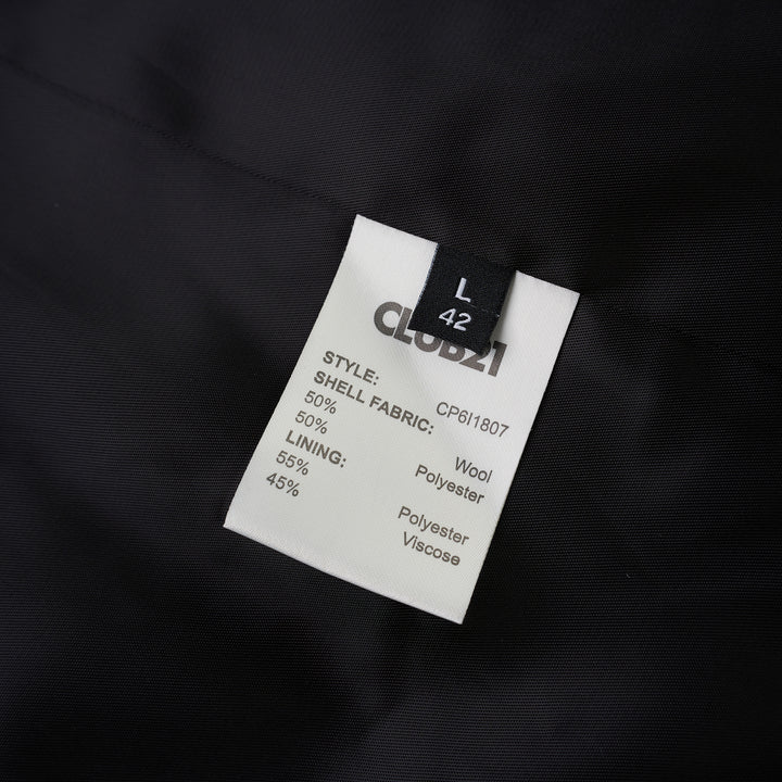 Black collarless wool-blend blazer with deep V neckline, single button closure and welt chest pocket, shown against a white background - view 3