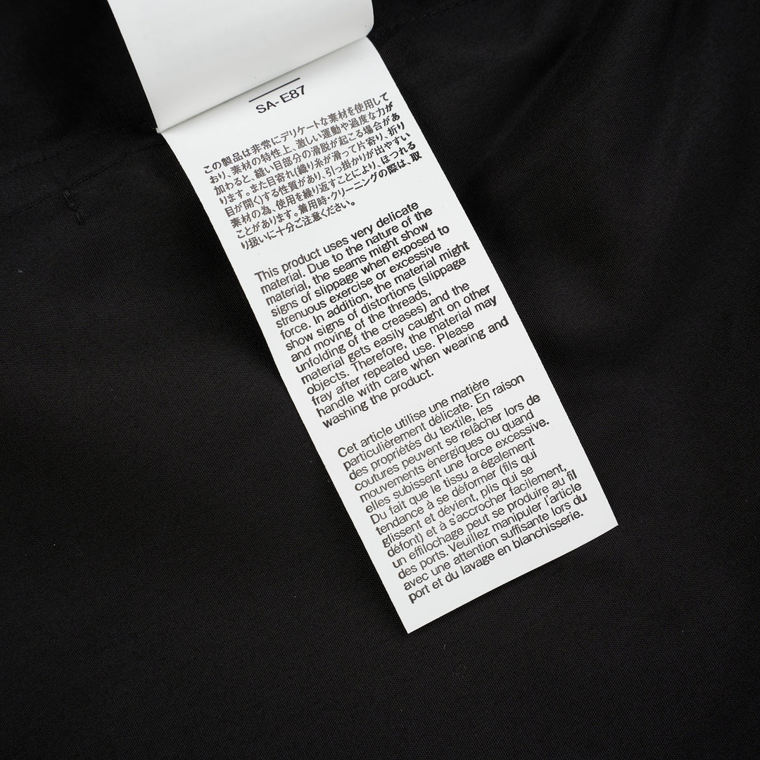 sacai Poplin X Suiting Shirt in black with double-breasted blazer front, peak lapels and gold anchor buttons over a poplin shirt body - view 8